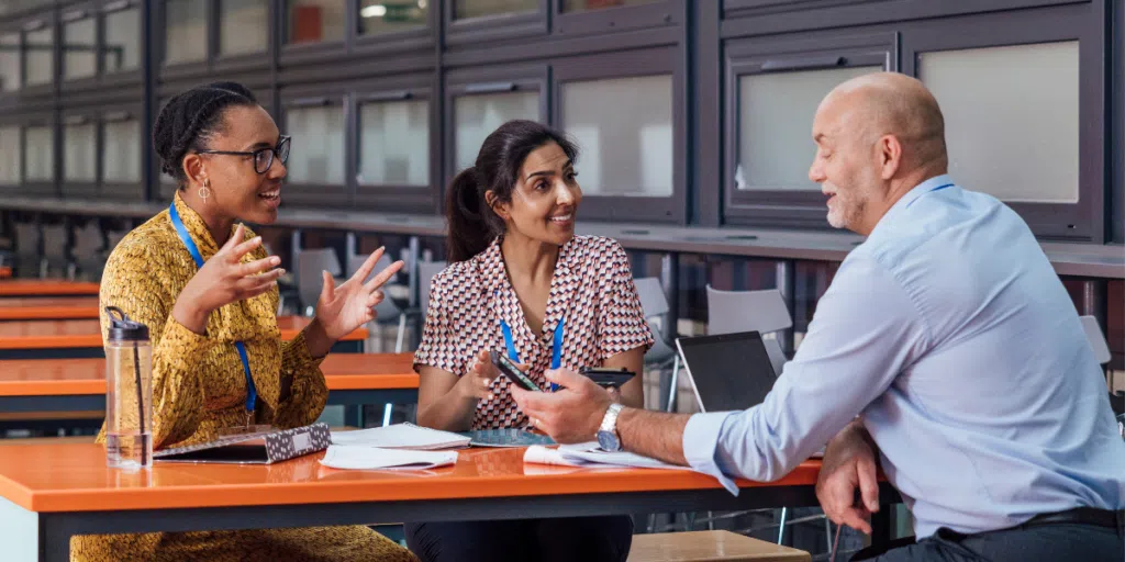 School Administrators Discussing at a Table